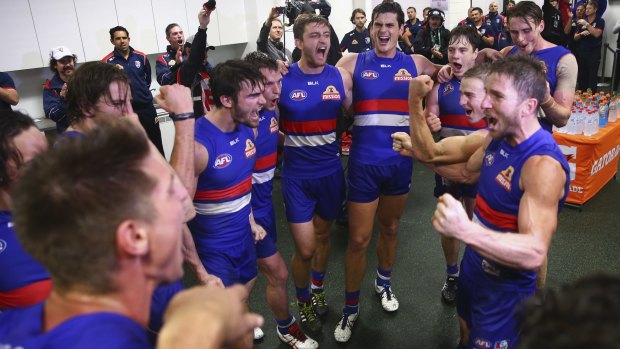 The Western Bulldogs celebrate after defeating the Sydney Swans.