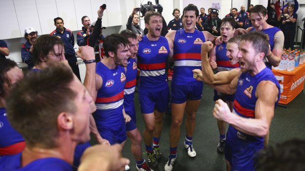 Deserving winners: The Bulldogs celebrate victory.