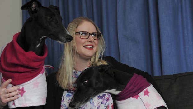 Alana Wade of Flynn at her home, with her two adopted greyhounds, Tiffany, left and Sugar.