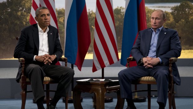 Tense: US President Barack Obama meets Russian President Vladimir Putin in Northern Ireland in June 2013.  