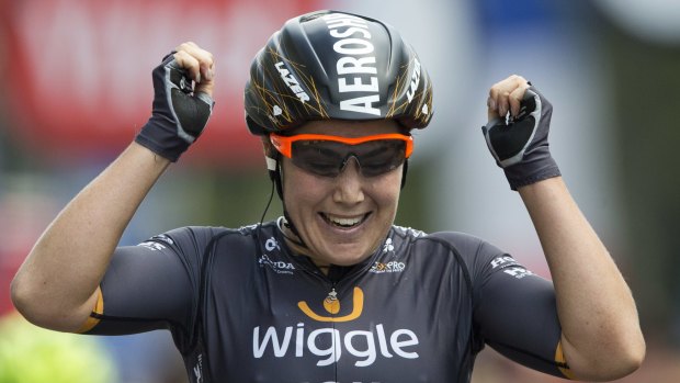 Sweet victory: Chloe Hosking celebrates after winning La course by Tour de France.