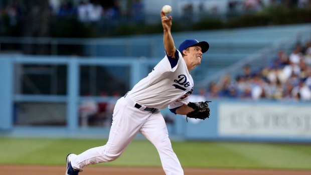 Moving on: Zack Greinke throws a pitch for the LA Dodgers.