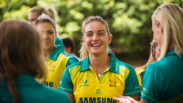 Diamonds youngster Liz Watson enjoys a laugh with teammates in Canberra on Thursday.