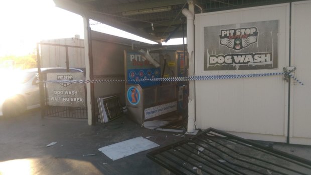 The scene of a failed ram raid at Calwell Shopping Centre. Thieves tried to steal a dog washing machine.