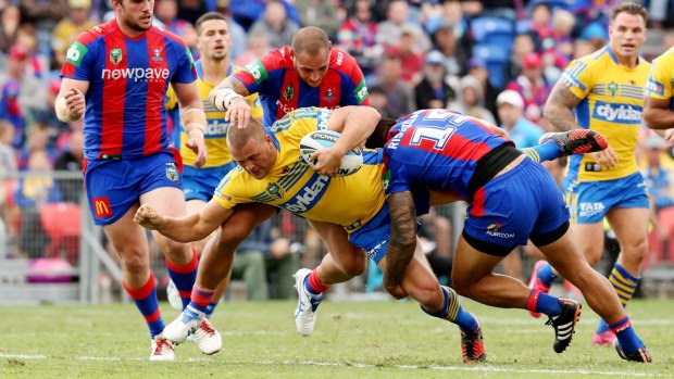 'I've got a family to play for': Danny Wicks put in a tough shift in the Eels' six-point win over the Knights.