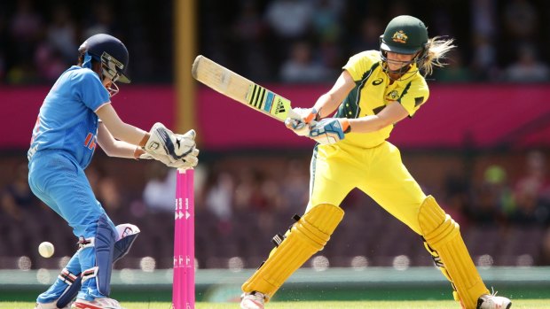 Australia's Ellyse Perry scored 55 runs and took 4-12 against India on Sunday.
