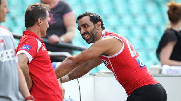 Former Swans player Adam Goodes shares a laugh with Dr Nathan Gibbs.