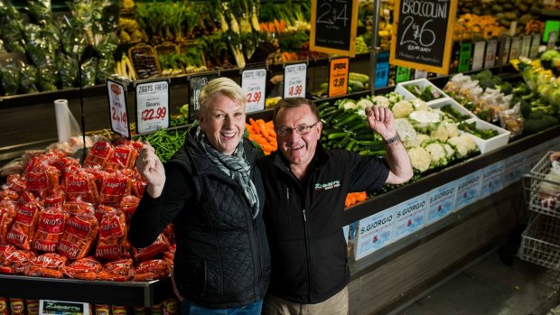 Owners of Ziggy's Fresh at the Fyshwick Fresh Food Markets, Toni and Ken Irvine, celebrate the shop being named Greengrocer of the Year.
