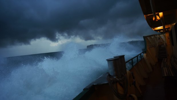 Large waves hit the Manly ferry on Thursday morning.