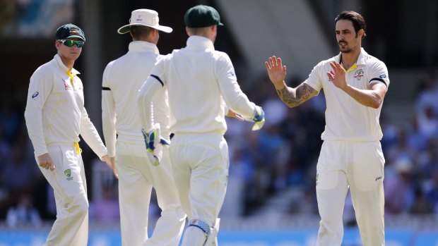 Striker: Australia's Mitchell Johnson celebrates the wicket of England's Moeen Ali.