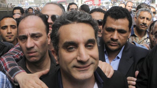 Bassem Youssef heading to the state prosecutor's office in 2013 on charges of insulting the president. 