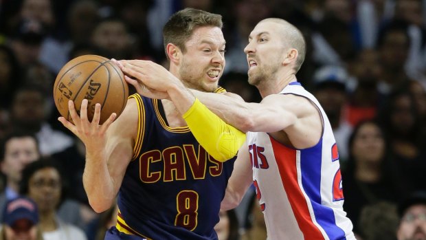 Old head: Steve Blake in action for Detroit against Matthew Dellavedova's Cavaliers. 