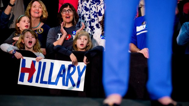 Narrow win: Supporters cheer as Democratic presidential candidate Hillary Clinton speaks in Louisville, Kentucky, on Sunday.