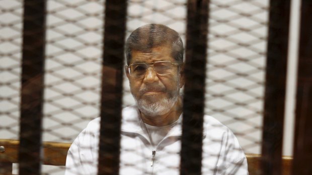 Ousted Islamist President Mohammed Morsi in the Police Academy courthouse in Cairo in 2014,