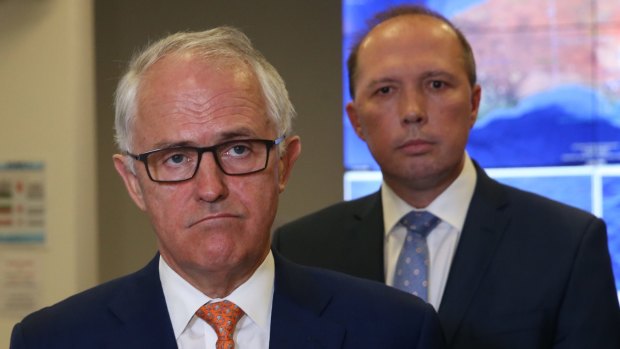 Prime Minister Malcolm Turnbull  says Immigration Minister Peter Dutton (right) has suffered constant, often vicious attacks. 