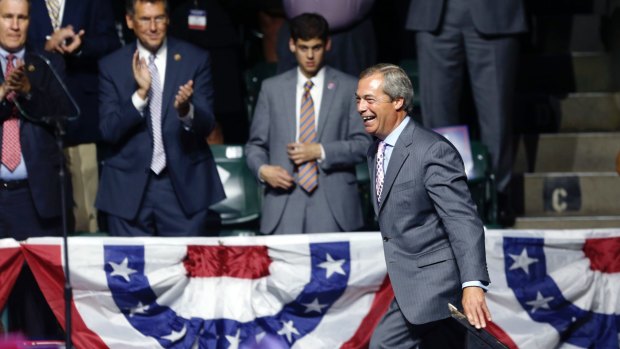 Nigel Farage arrives onstage in Jackson, Mississippi.