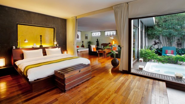 French architectural elegance meets tropical luxury at the Heritage Suites Hotel in Siem Reap. 