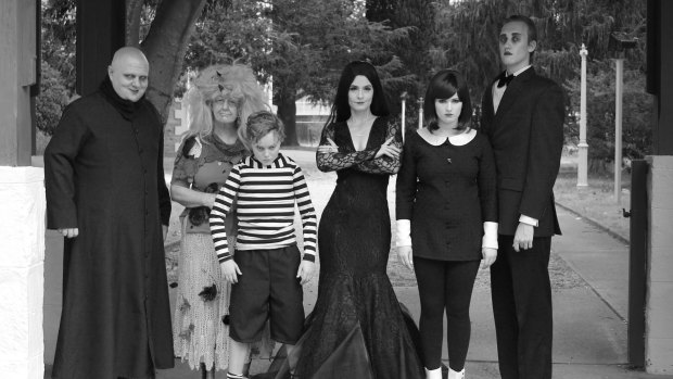 In <i>The Addams Family</i>: from left, Uncle Fester (Tim Stiles), Grandma (Barbara Denham), Morticia (Lainie Hart), Wednesday (Rachel Thornton), Lurch (Nathan Rutups).