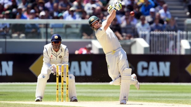 Dominating: Australian captain Steve Smith smashes a six off India's Ravi Ashwin on day two of the Boxing Day Test at the MCG.