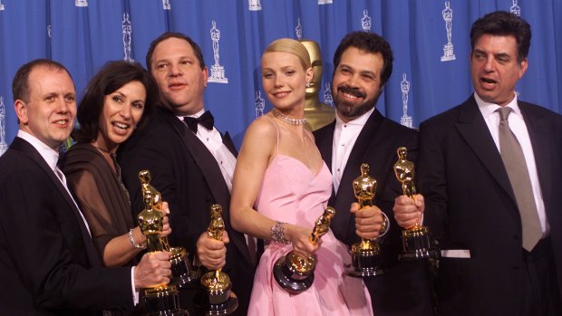 Harvey Weinstein (third from left) on stage at the 1999 Academy Awards celebrating the success of Shakespeare in Love, for which Gwyneth Paltrow won best actress.