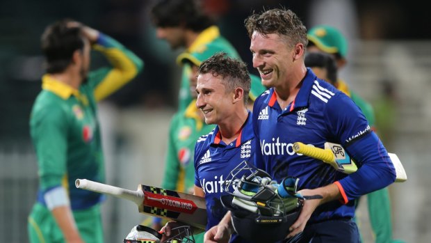 Victorious: England's James Taylor and Jos Buttler leave the pitch after the third ODI between Pakistan and England at the Sharjah Cricket Stadium in the United Arab Emirates.