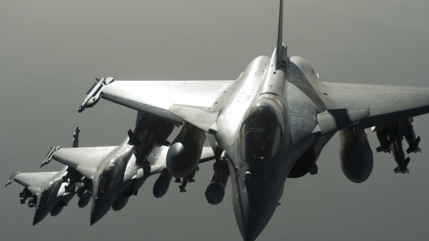 French army Rafale fighter jets fly towards Syria as part of France's support of the US-led coalition against Islamic State group. France is the world's fourth-largest weapons supplier.