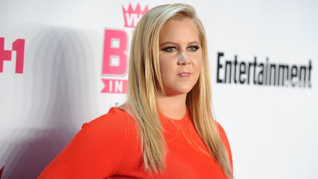 Comedian Amy Schumer says living with a parent with MS makes you focus on the "serious questions".