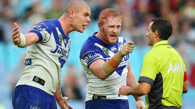 Bad dogs: David Klemmer and James Graham confront referee Gerard Sutton on Friday.