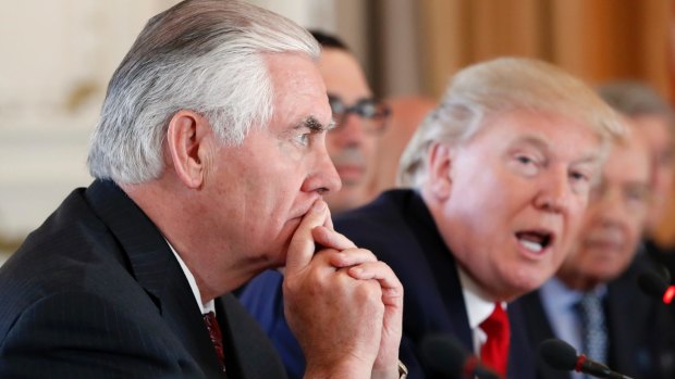 On the same page? US Secretary of State Rex Tillerson, left, in a meeting with President Donald Trump.