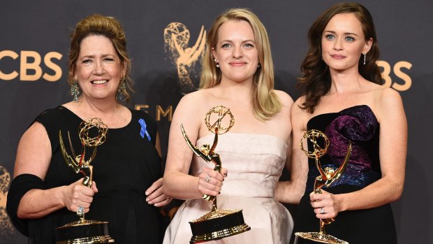 Ann Dowd, Elisabeth Moss and Alexis Bledel from The Handmaid's Tale with their Emmys.
