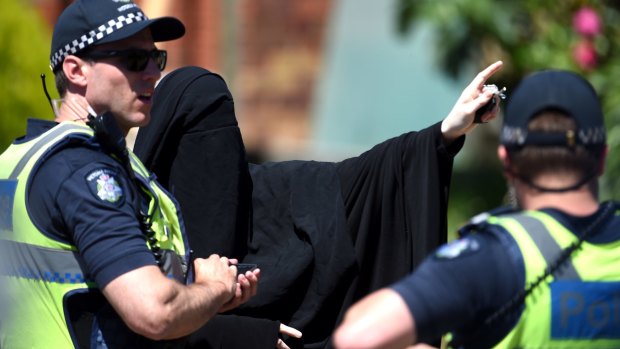 A woman speaking to police in Meadow Heights.