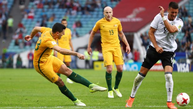 Attacking brightspot: Tommy Rogic shoots for goal for the Socceroos against Germany.