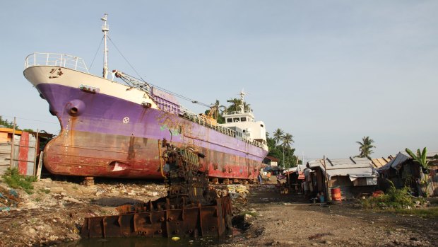 A ship driven ashore in Tacloban in the Philippines by Haiyan.