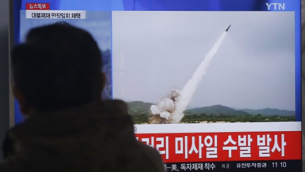 A man watches a news bulletin last week showing footage of a missile launch conducted by North Korea.