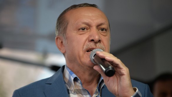 Turkish President Tayyip Erdogan delivers a speech to his supporters in Istanbul after the failed coup.