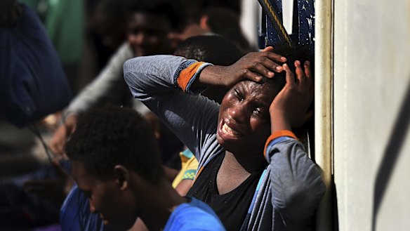 Refugees continue to flood into Europe. Pictured: a woman aboard a European ship after being rescued in the Mediterranean. 