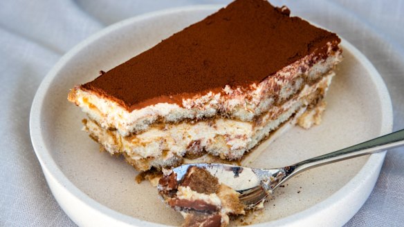 Tiramisu with dense layers of mascarpone lightened with sponge. 