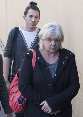 Aron Dennis and Roxene Dennis, mother of Kristen Schroder, leave Glebe Coronor's Court.