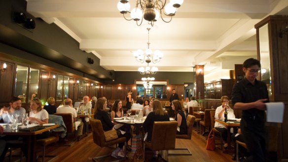 The interior is a cross between a wild west saloon and a baronial dining hall.