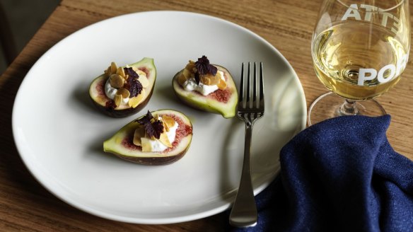 Figs with stracciatella and spiced olive oil.