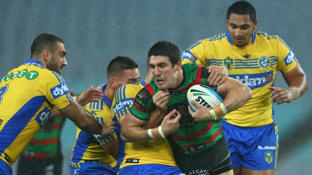 Missing the action: Friday night's Parramatta-South Sydney game was played against a backdrop of blue seats at ANZ Stadium.