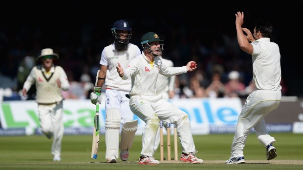 Shaun Marsh celebrates with Mitchell Johnson after catching out Moeen Ali on the final day of the second Test at Lord's. 