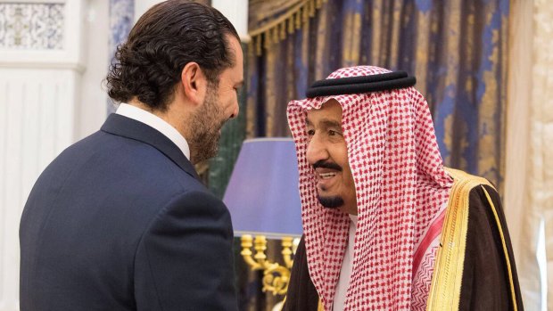 Saudi King Salman, right, shakes hands with Lebanese Prime Minister Saad Hariri in Riyadh after Hariri's 'resignation'.