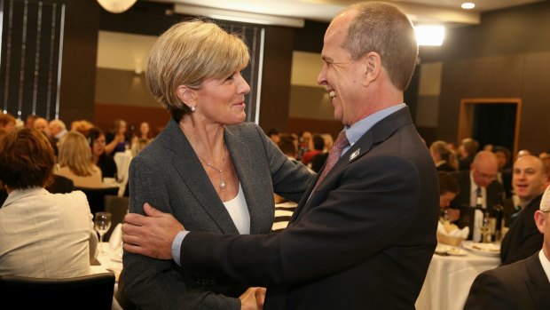 Foreign Affairs Minister Julie Bishop greets journalist Peter Greste ahead of his address at the National Press Club of Australia in Canberra on Thursday.
