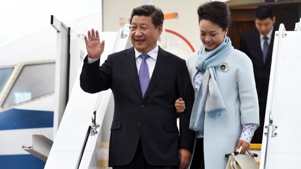 China's President Xi Jinping and his wife Peng Liyuan arrive in Hobart.