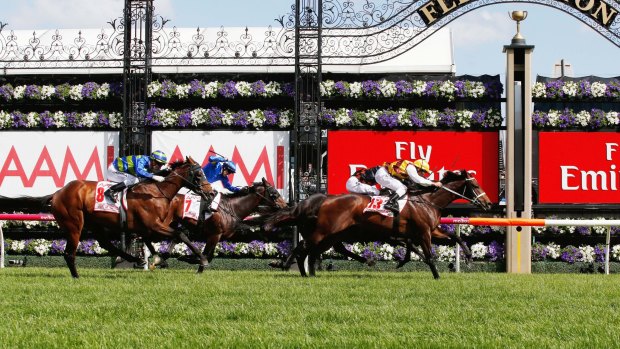 Preferment, ridden by Damien Oliver, wins the Victoria Derby at Flemington on Saturday.
