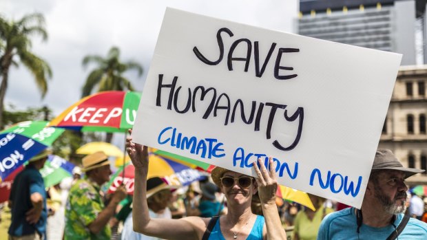 People rally for climate action in Brisbane last month. Australia has ranked poorly on its climate performance among major emitters, according to a new score card.