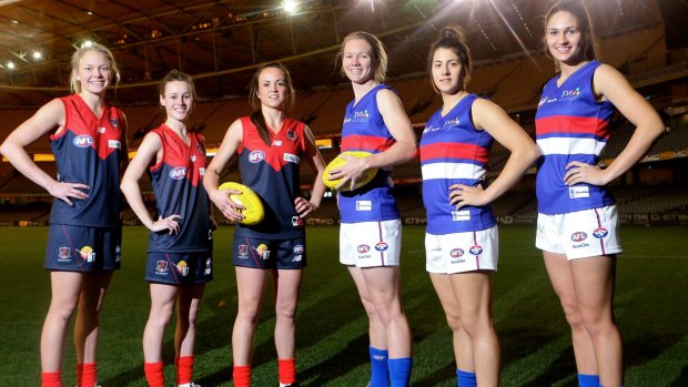 Blazing a trail: Demons and Dogs players before the women's exhibition match in June.
