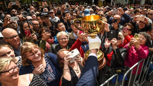 Huge crowds turn out for Melbourne Cup Carnival events. 