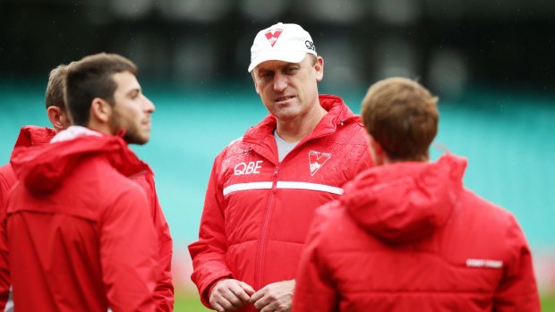 Top bloke: John Longmire cares about his players on and off the field.